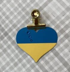 SDC706, In Support of Ukraine. I clip it to whatever I’m wearing every day. Today a gal at ...